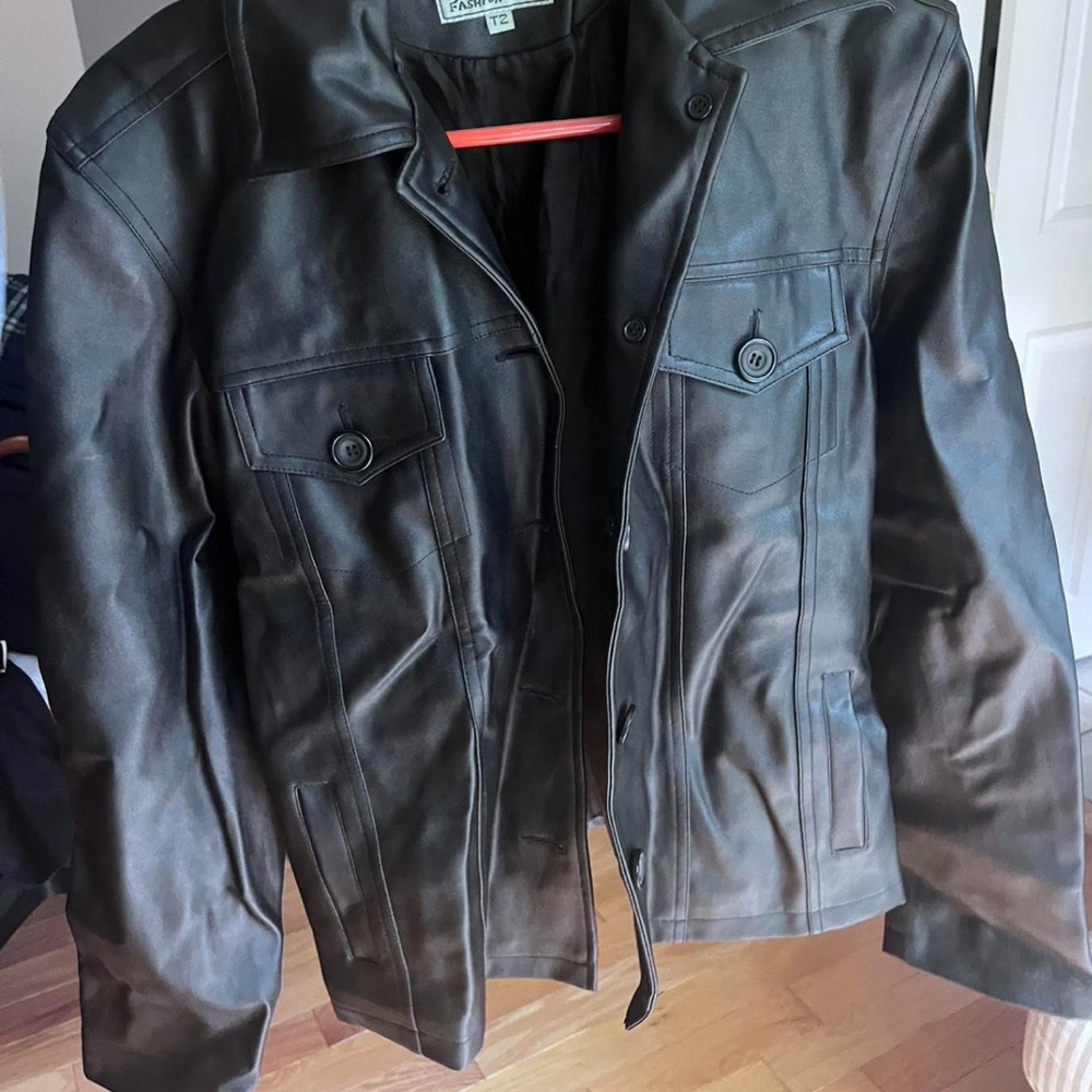 Reposh- “Leather jacket (bought in Spain)”.